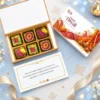 LuwuBox 6-piece Diwali cracker chocolate gift box with TCS-branded lid and personalized message card.